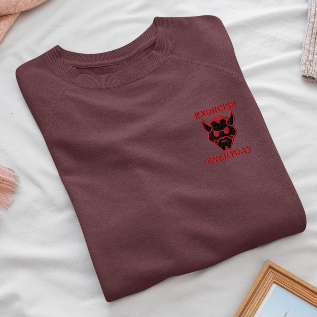 a t - shirt with a picture of a demon on it