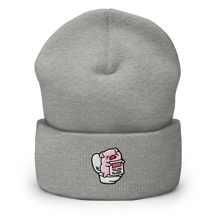 a grey beanie with a pink fist on it