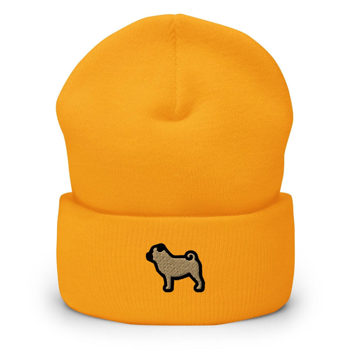 a yellow beanie with a black pug on it
