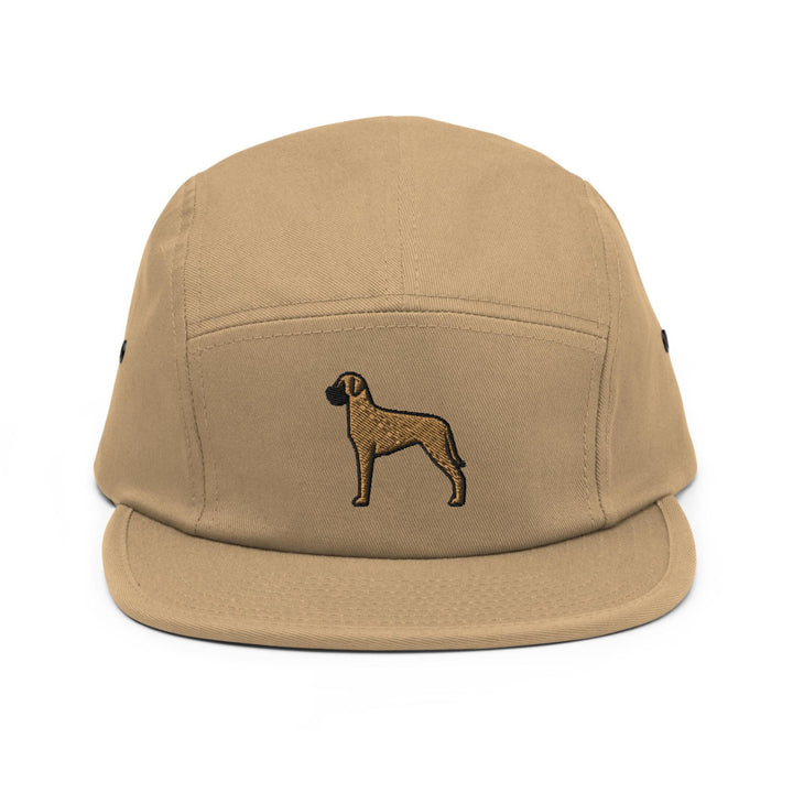 a tan hat with a brown dog embroidered on it