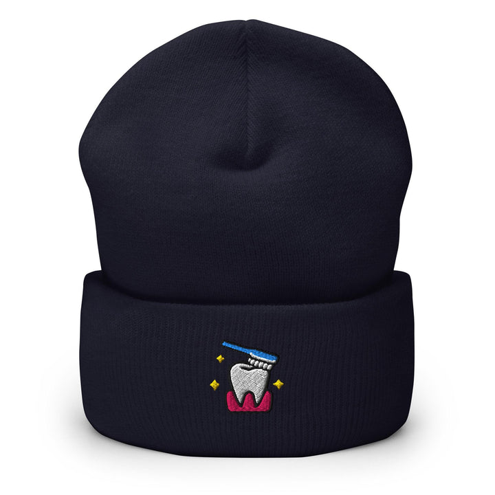 a beanie with a tooth and a toothbrush on it