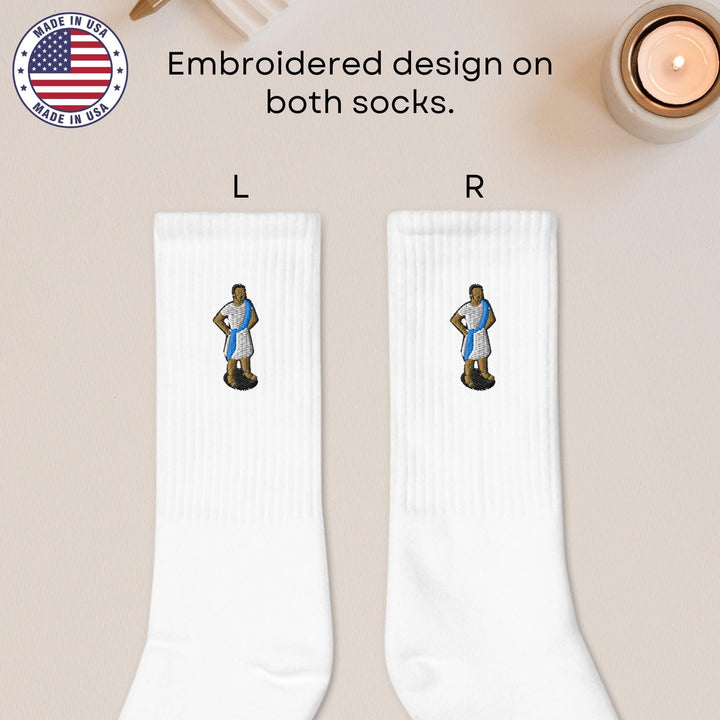 a pair of socks with a picture of a man on it