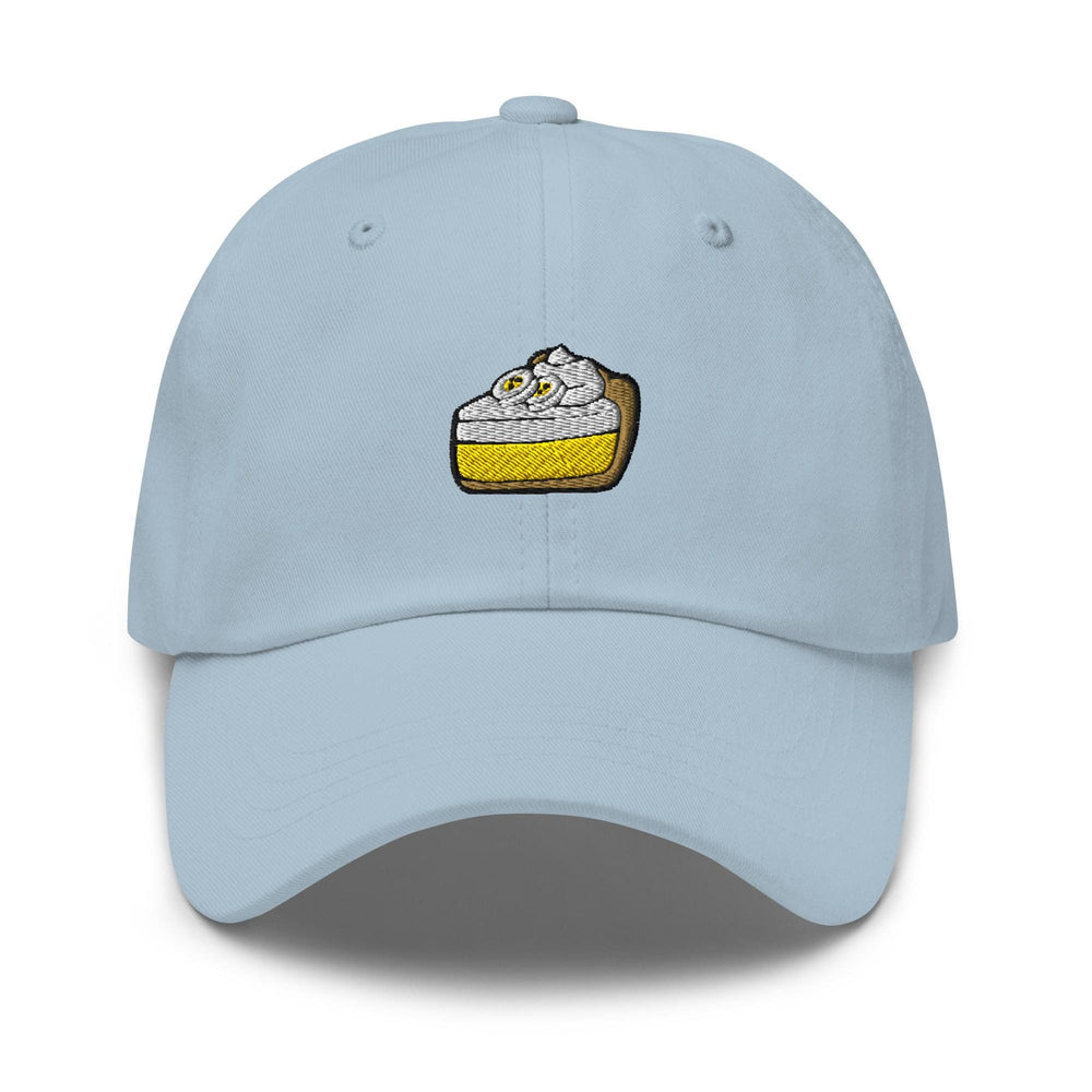 a light blue hat with a piece of cake embroidered on it