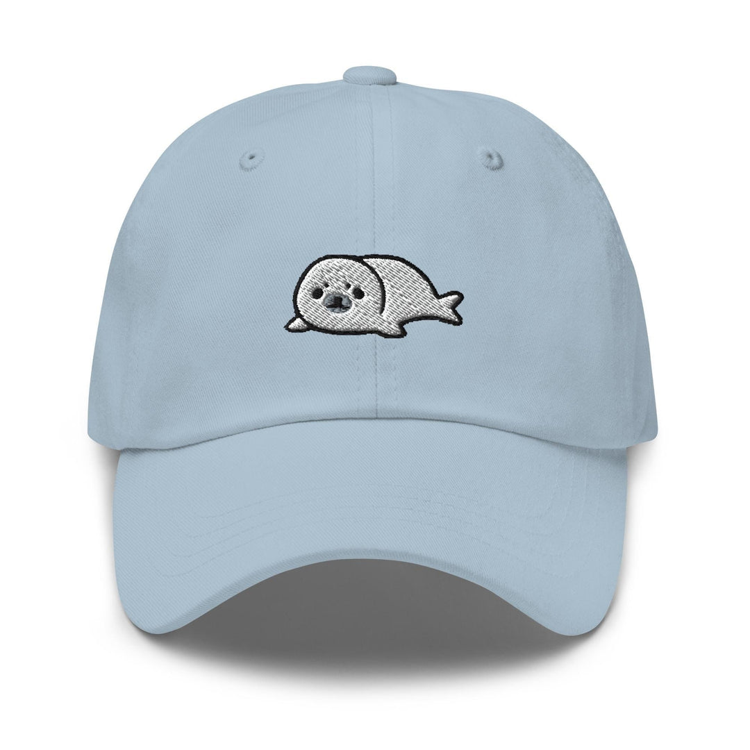 a light blue hat with a skull embroidered on the front