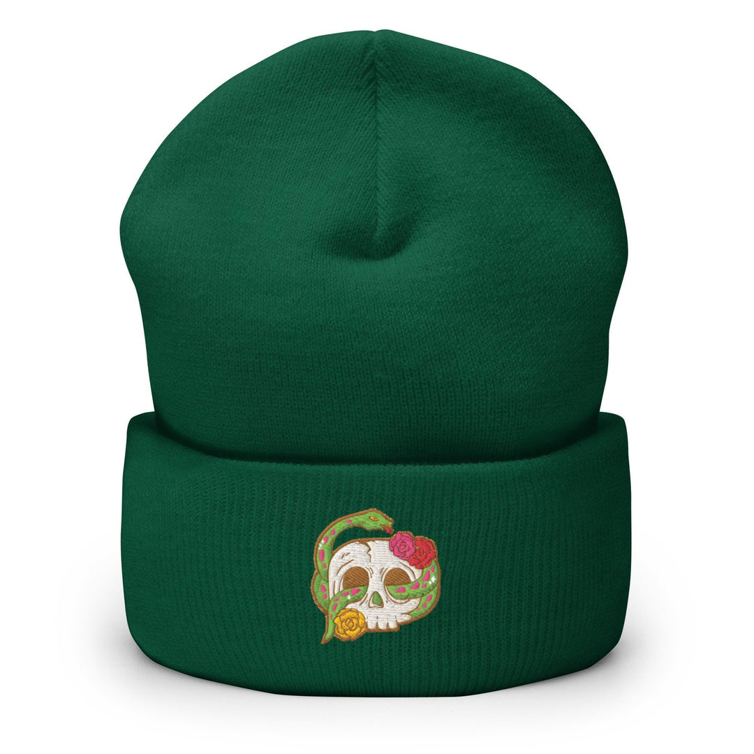 a green beanie with a skull on it