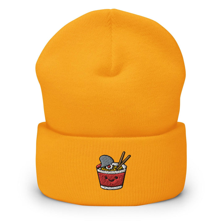 a yellow beanie with a picture of a cup of ice cream and spoons