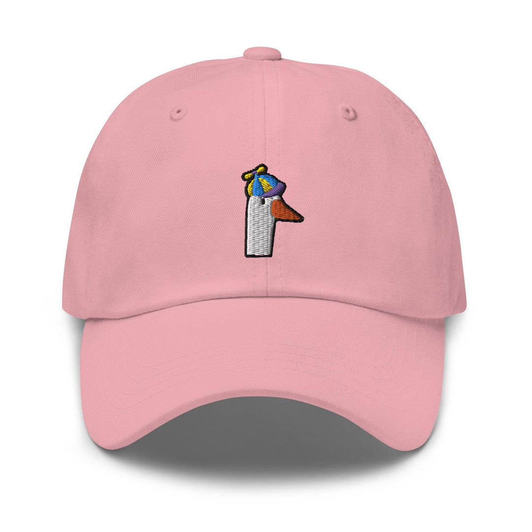 a pink hat with a bird on it