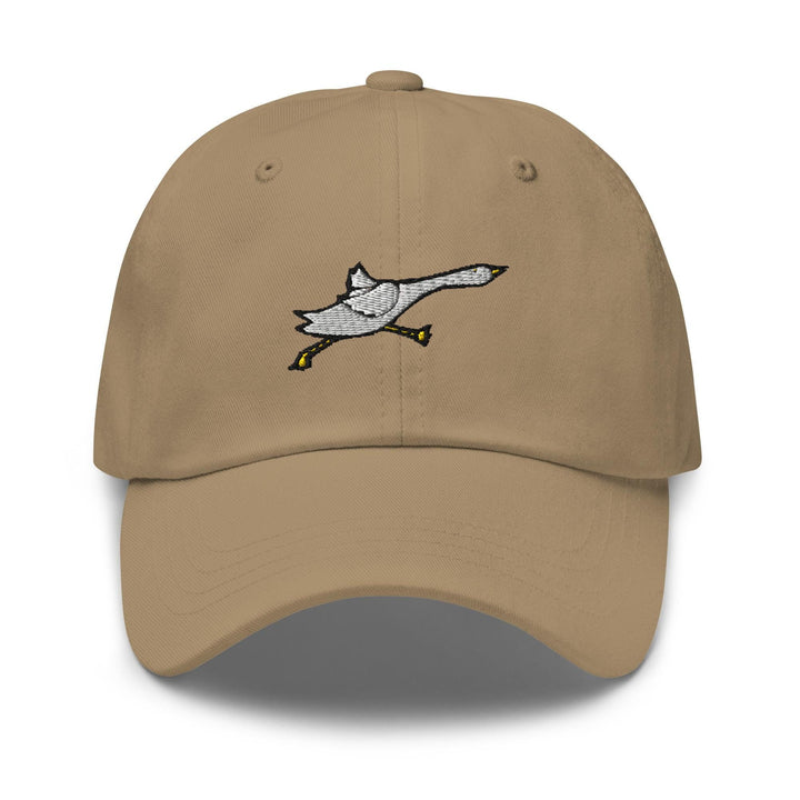 a baseball cap with a bird embroidered on it