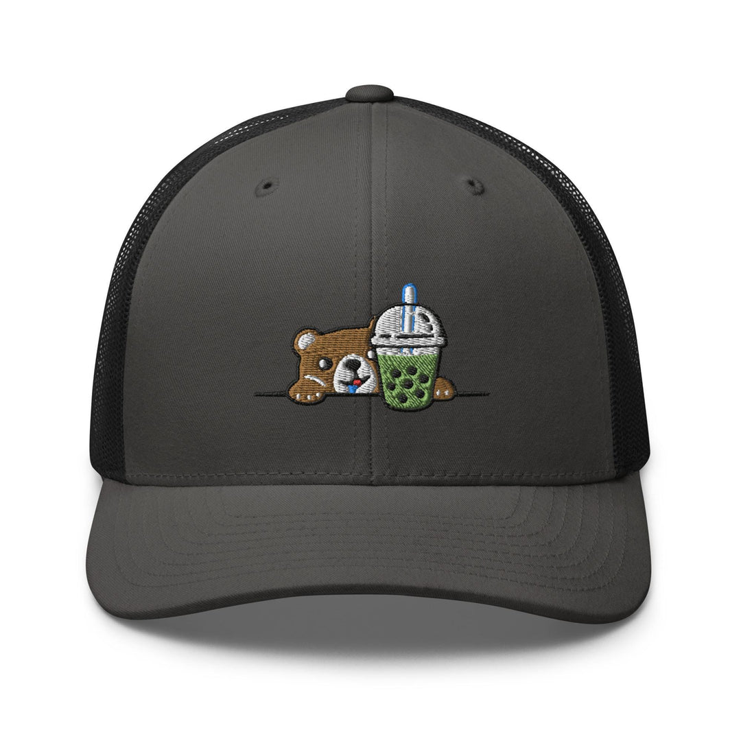 a gray and black trucker hat with a bear holding a cup