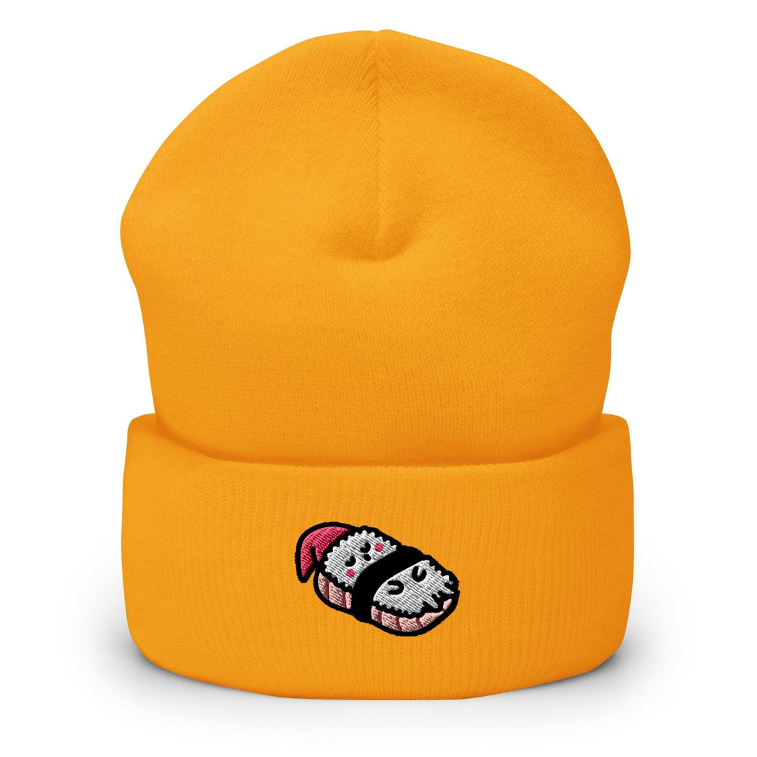 a yellow beanie with a cartoon character on it