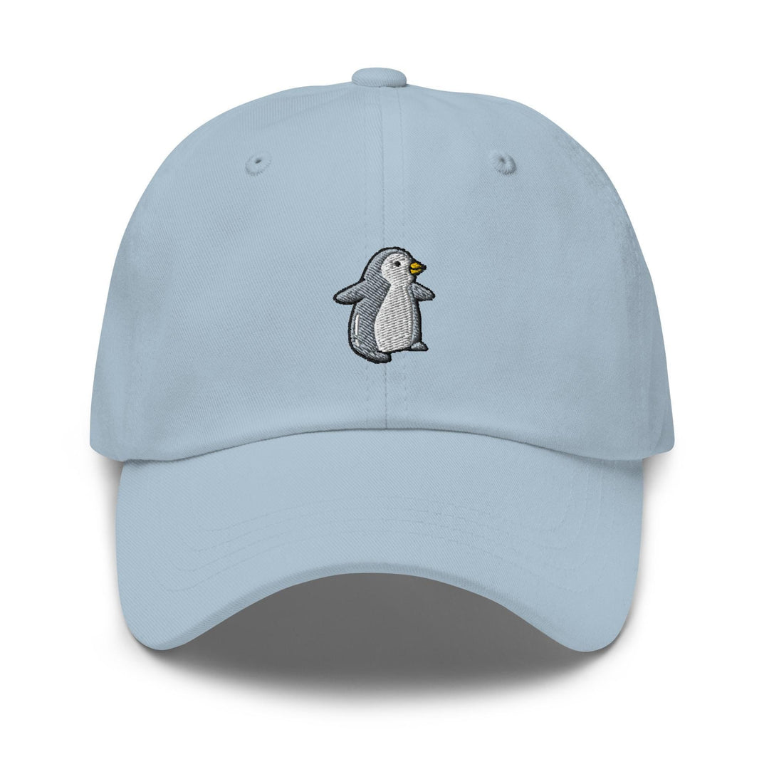 a light blue hat with a penguin embroidered on it
