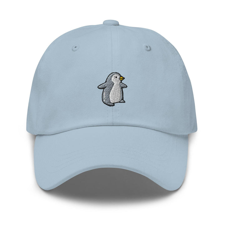 a light blue hat with a penguin embroidered on it
