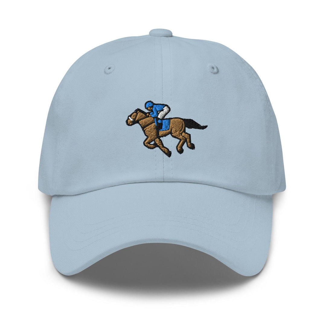 a light blue hat with a horse and jockey on it