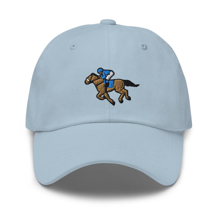 a light blue hat with a horse and jockey on it
