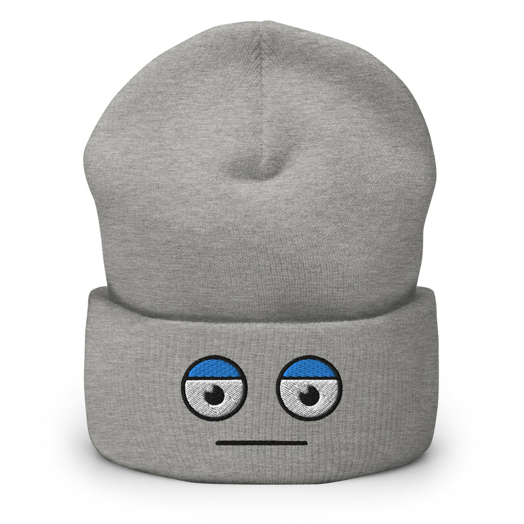 a grey beanie with a sad face on it