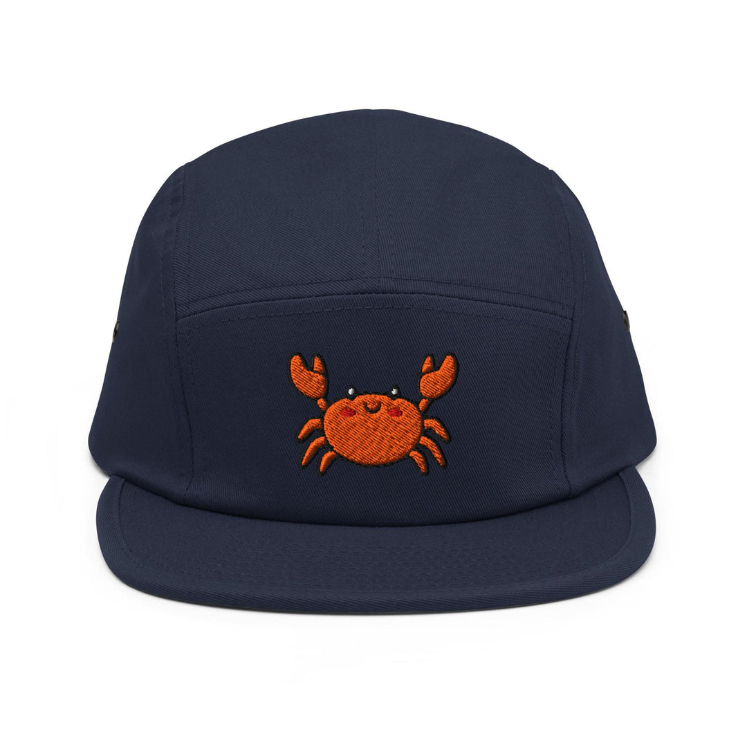 a blue hat with a crab embroidered on it
