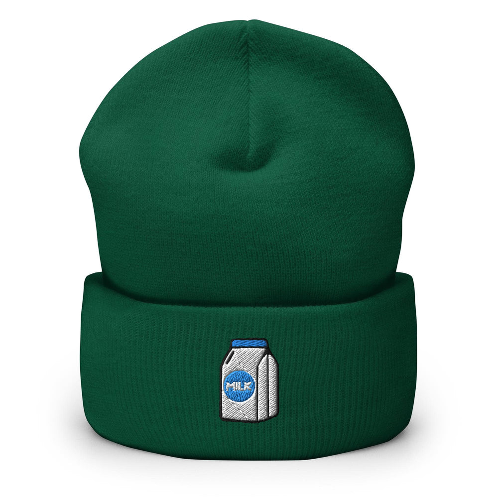 a green beanie with a bottle of milk on it