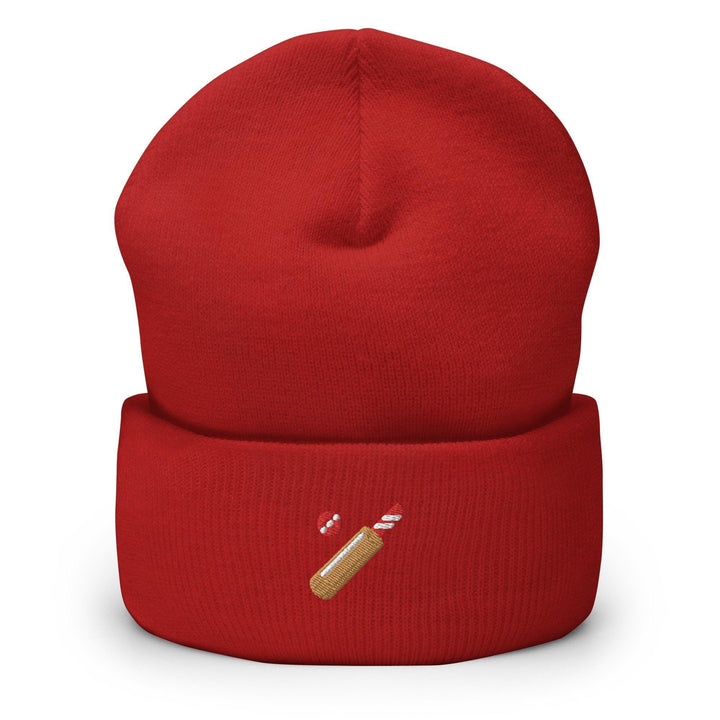 a red hat with a cigarette embroidered on it