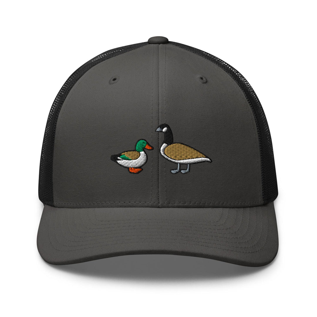 a gray trucker hat with two ducks on it