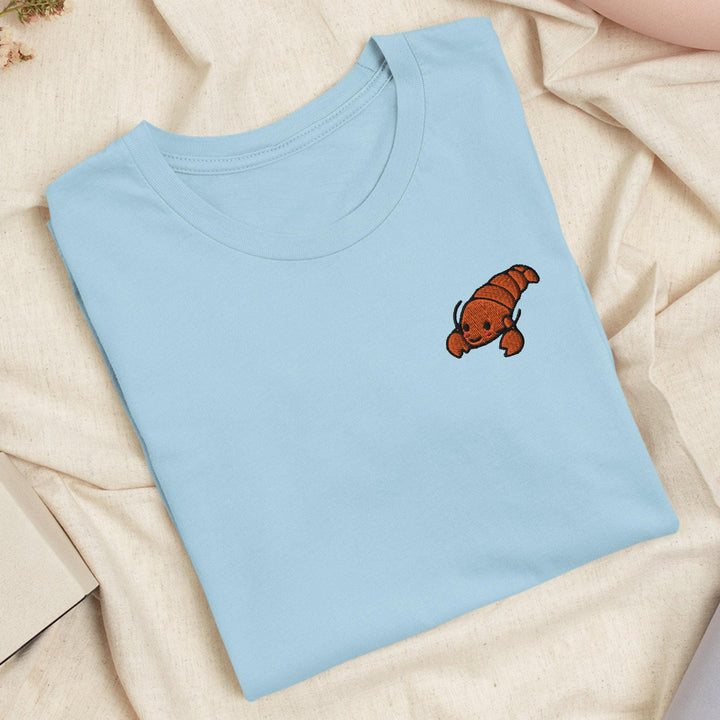 a blue t - shirt with a picture of a dog on it