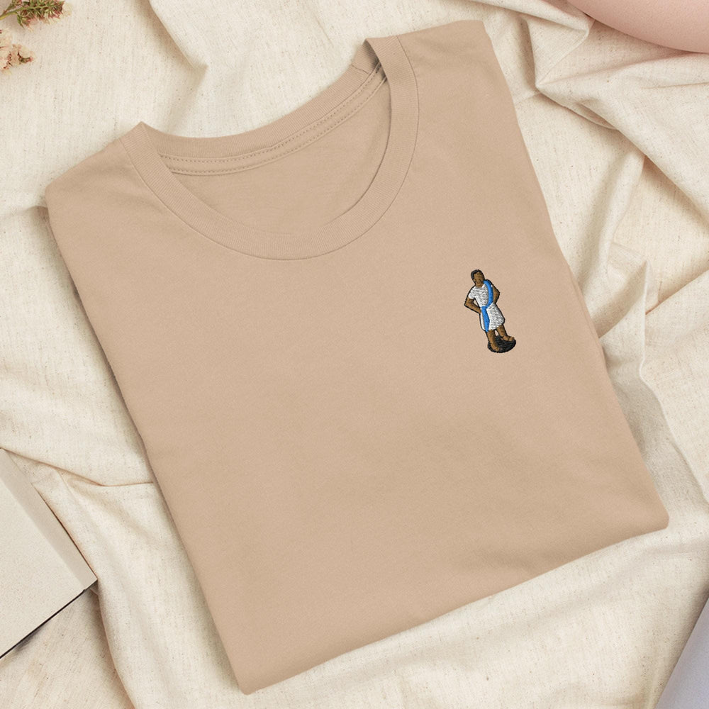 a t - shirt with a picture of a man on it