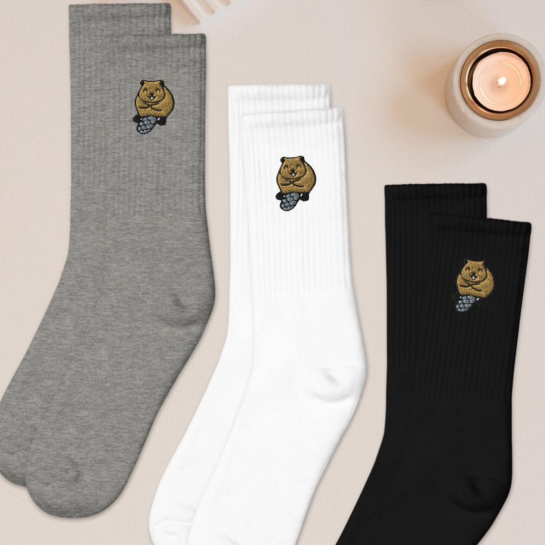 three pairs of socks with bears on them