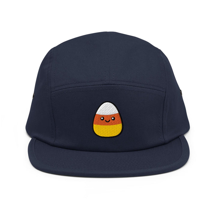 a blue hat with a cartoon face on it