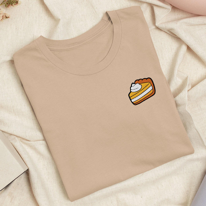 a t - shirt with a piece of cake on it