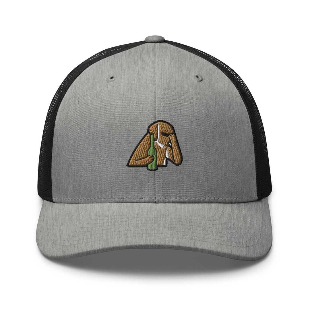 a grey and black hat with a picture of a hand holding a leaf