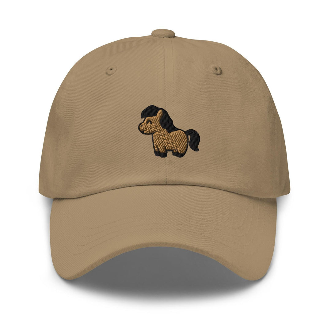 a tan hat with a black dog embroidered on it