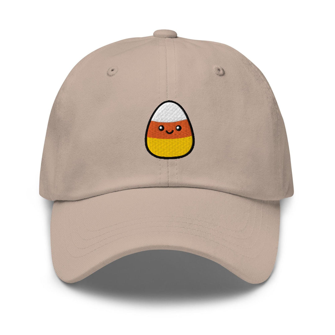 a tan hat with an orange and white egg on it