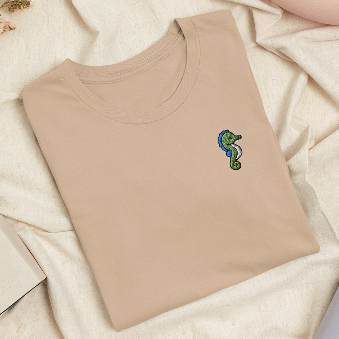 a t - shirt with a snake embroidered on it