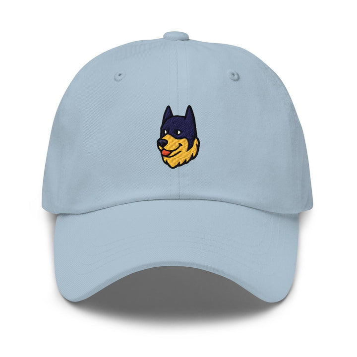 a light blue hat with a cartoon dog on it