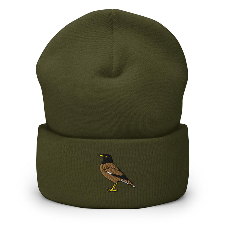 a green hat with a bird embroidered on it