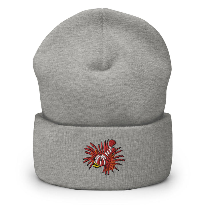 a gray beanie with a red and white design on it