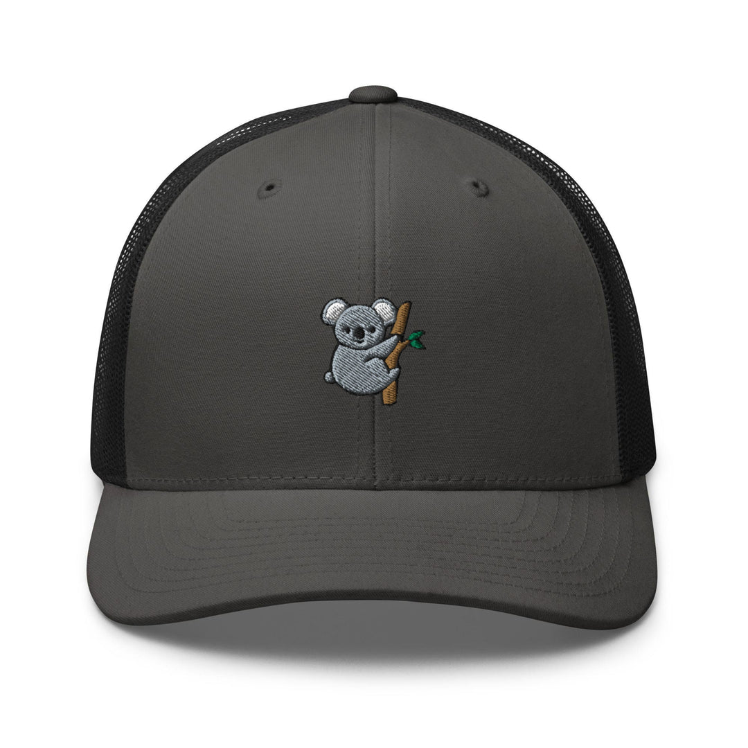 a grey and black trucker hat with a koala on it