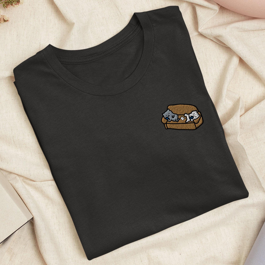 a black t - shirt with a picture of a sandwich on it