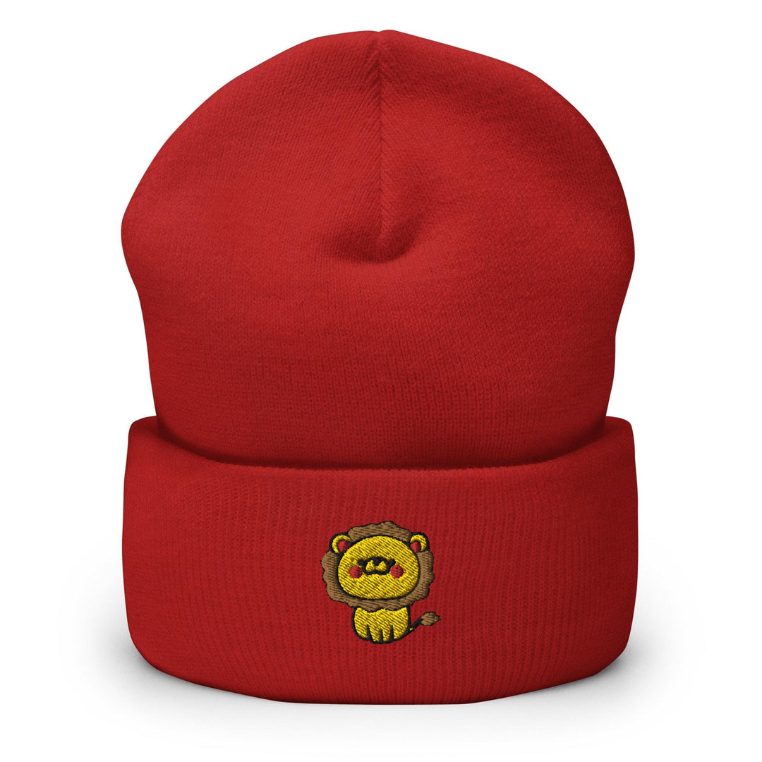 a red hat with a yellow lion on it