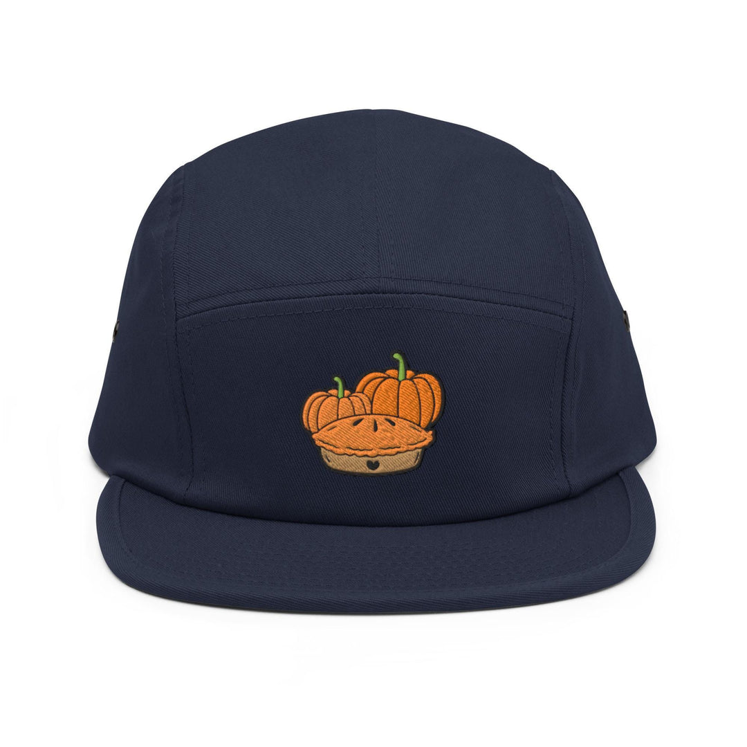 a blue hat with a picture of pumpkins on it