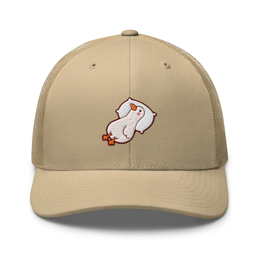 a tan trucker hat with a white cat embroidered on the front