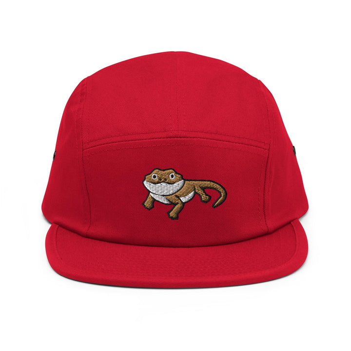 a red hat with a cartoon animal on it