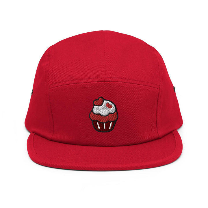 a red hat with a cupcake embroidered on it