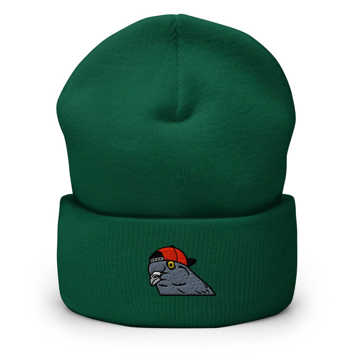 a green beanie with a red hat on top of it