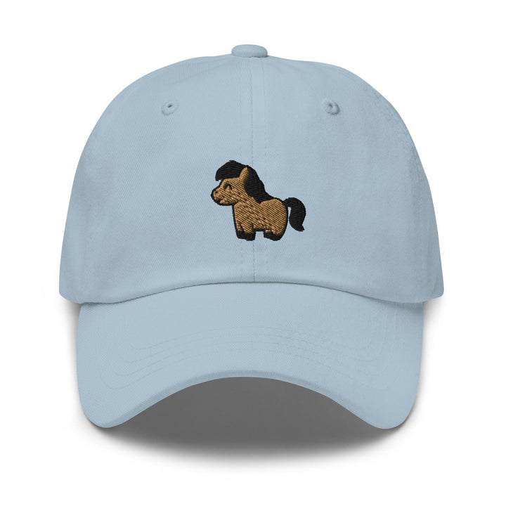 a light blue hat with a dog embroidered on it