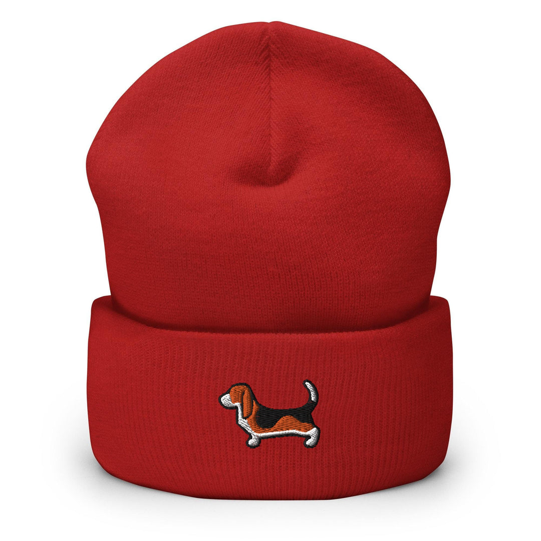 a red beanie with a dog embroidered on it