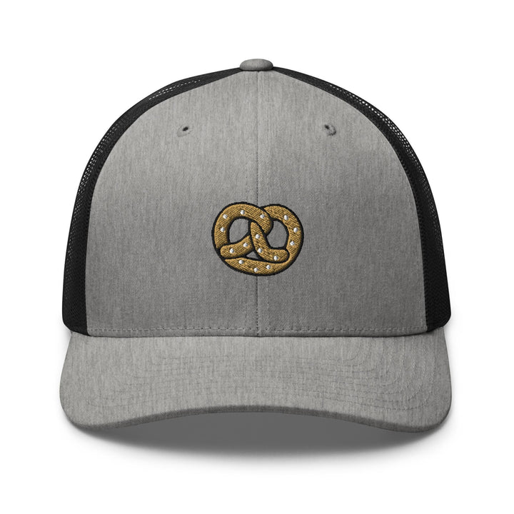 a gray and black hat with a pretzel on it