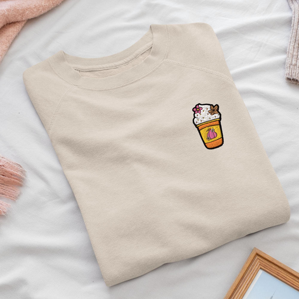 a t - shirt with a picture of a cup of coffee on it