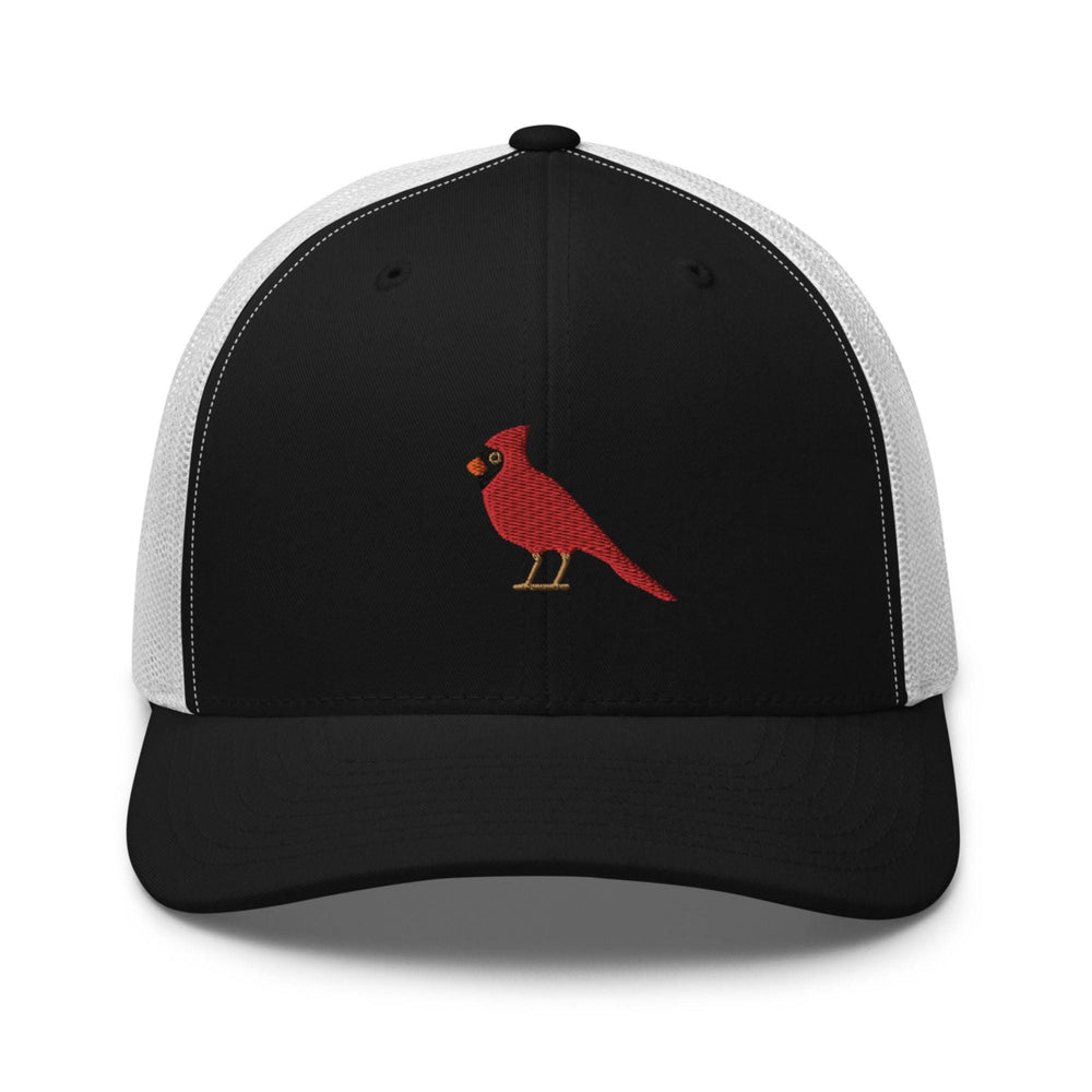 a black and white trucker hat with a red bird on it