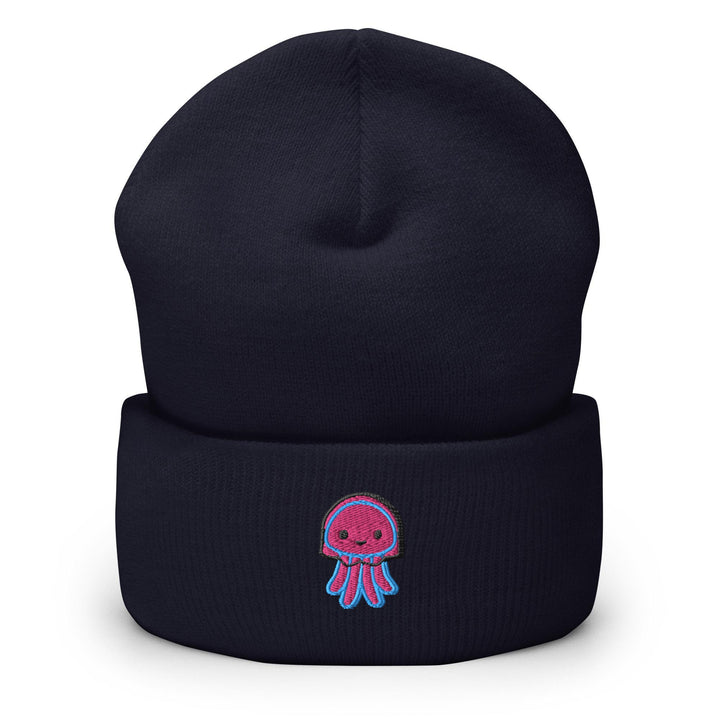 a blue beanie with a pink octopus on it