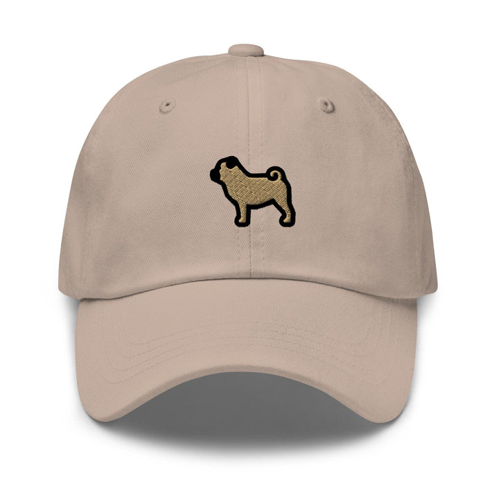 a tan hat with a black dog embroidered on it